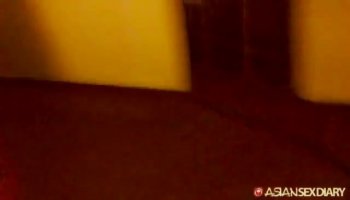 Naughty Asian enjoys a hot hardcore fuck